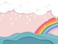 Rainy cloud and rainbow over the sea