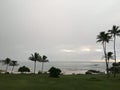 Rainy and Cloudy Sunrise in October in Wailua Bay near Hikinaakala Heiau on Kauai Island, Hawaii.
