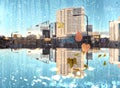 Rainy day in city modern buildings panorama rain drops on window glass and Autumn leaves falling Royalty Free Stock Photo