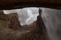 A rainy day in March brings extra water pouring over the waterfall at Weeping rock in Zion national park Utah Royalty Free Stock Photo