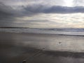 High wave on the beach in rain weather Royalty Free Stock Photo