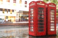 Rainy day.Red Phone cabines in London