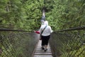 Rainy day suspension bridge walk