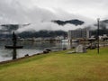 Rainy day at Suwa Lakeside Park with heavy clouds covering the mountains around Lake Suwako