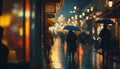 Rainy day in Tokyo, Japan. People walking in the street.