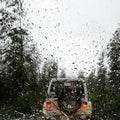 Rainy drive in the woods