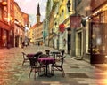 Rainy evening in city street cafe tables empty pink umbrella on old pavement people walking store blurred light Tallinn old town E Royalty Free Stock Photo