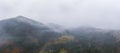 Rainy foggy weather in the Carpathian valley in beautiful Ukraine in the village of Dzembronya Royalty Free Stock Photo