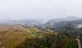 Rainy foggy weather in the Carpathian valley in beautiful Ukraine in the village of Dzembronya Royalty Free Stock Photo