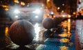 Rainy night in a big city, reflections of lights on the wet road surface.