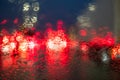 Rainy Night Traffic Lights Bokeh on Windshield Royalty Free Stock Photo