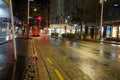 Rainy night and wet city street in darkness of morning Royalty Free Stock Photo