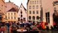 Rainy old town of Tallinn ,Estonia 20,08,2019 people walk with umbrellas holiday tourist urban city lifestyle travel to Baltic