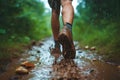 Rainy Race: Man\'s Legs Powering Through the Wet.