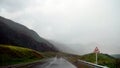 Rainy road in Altai Mountains, Russia Royalty Free Stock Photo