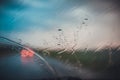 Rainy road through car window