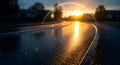 Rainy Road Curve Sunset Double Rainbow with Glowing Sun and Wet Surface Royalty Free Stock Photo