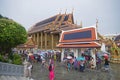 Rainy season at the busy and crowded temple of the Emerald Buddha within the precincts of the Grand Palace, Bangkok, Thailand