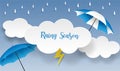 Rainy season. design with raining drops, umbrella and clouds on blue background.
