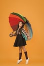 Rainy september. Towards knowledge. Schoolgirl with backpack. Schoolgirl daily life. Girl with umbrella. Rainy day