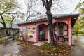 Rainy view of the Greetings From Austin Mural