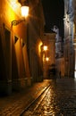 Rainy walk the cobbled street at night