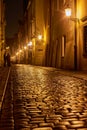 Rainy walk the cobbled street at night