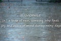 Rainy weather background with text `PLUVIOPHILE - a lover of rain, someone who finds joy and peace of mind during rainy days`