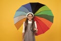 rainy weather forecast. back to school. tween with vivid rain protection. happy school girl Royalty Free Stock Photo