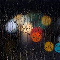 Rainy Wet Window at Night with Water Drops and City Lights Royalty Free Stock Photo