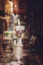 A picture of a man sells birds here in local flock market.