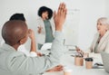 Raise your hand if youre in the world of business. a businesswoman raising his hand to ask a question in a meeting at Royalty Free Stock Photo