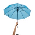 Raised arm holding a bright blue umbrella canopy high on a plain white background, ai image isolated on white background Royalty Free Stock Photo