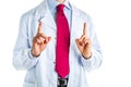 Raised both forefingers gesture by doctor in white coat Royalty Free Stock Photo