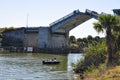 Raised Drawbridge and Fishermen