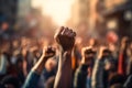 Raised fist in crowd of rioting angry people Royalty Free Stock Photo