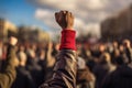 A raised fist of a protestor. large group of protesters. Generative AI