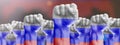 Raised fists against the background of the national flag of Russia. The concept of a revolution. Protests against the