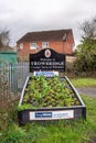 Welcome to Trowbridge sign and flower bed