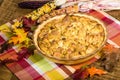 Raisin bread pudding desert with fall decorations Royalty Free Stock Photo