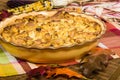 Raisin bread pudding desert with fall decorations Royalty Free Stock Photo