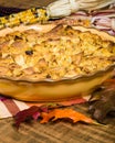 Raisin bread pudding desert with fall decorations Royalty Free Stock Photo