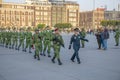 Raising flag guards on Zocalo in Mexico City, Mexico