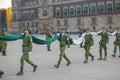 Raising flag guards on Zocalo in Mexico City, Mexico