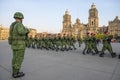 Raising flag guards on Zocalo in Mexico City, Mexico