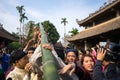 Raising Neu tree rituals in communal house at So village, Quoc Oai district. The bamboo pole placed