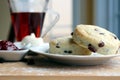 Raisins scones with raspberries jam Royalty Free Stock Photo