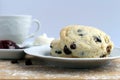 Raisins scones with raspberries jam Royalty Free Stock Photo