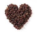 Raisins in the shape of a heart placed on a white background