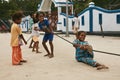 Happy children playing rope pulling game in Indonesian village Royalty Free Stock Photo